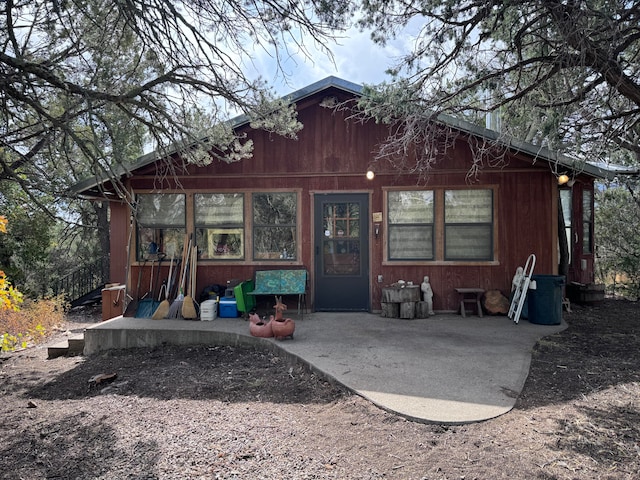 rear view of house featuring a patio area