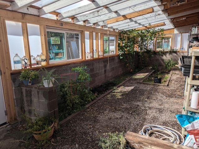 view of side of property with a pergola