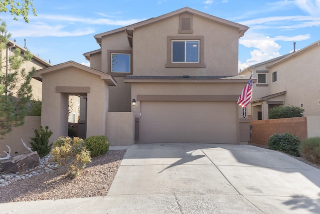 front of property with a garage