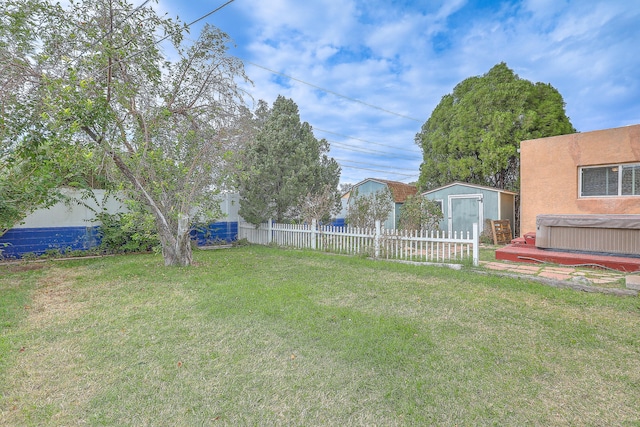 view of yard with a storage shed