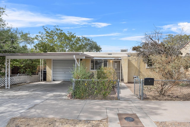 view of front of home featuring a carport