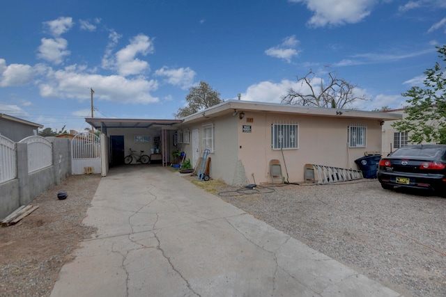 view of front of house with a carport