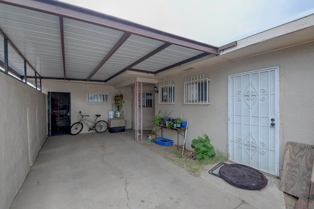 property entrance with a patio area