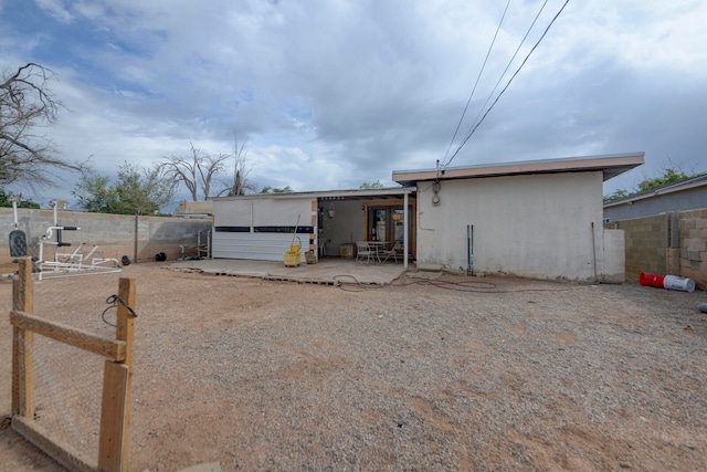 view of front of home with a patio area