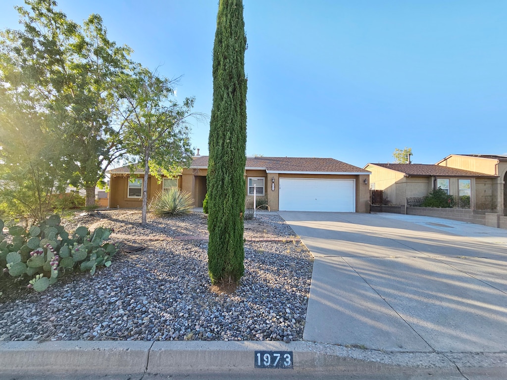 single story home with a garage