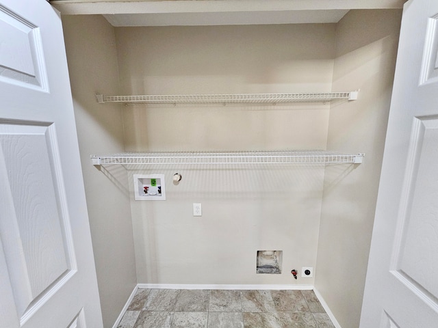 laundry area featuring electric dryer hookup, gas dryer hookup, and washer hookup