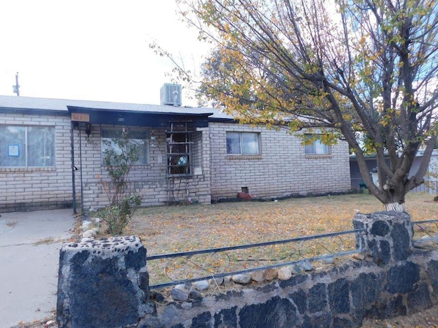 view of front of home with cooling unit