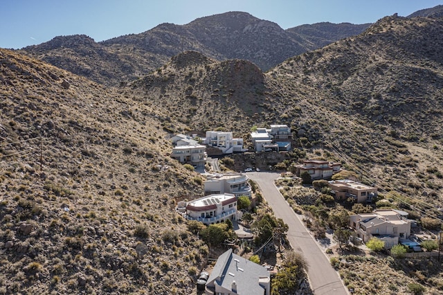 birds eye view of property with a mountain view