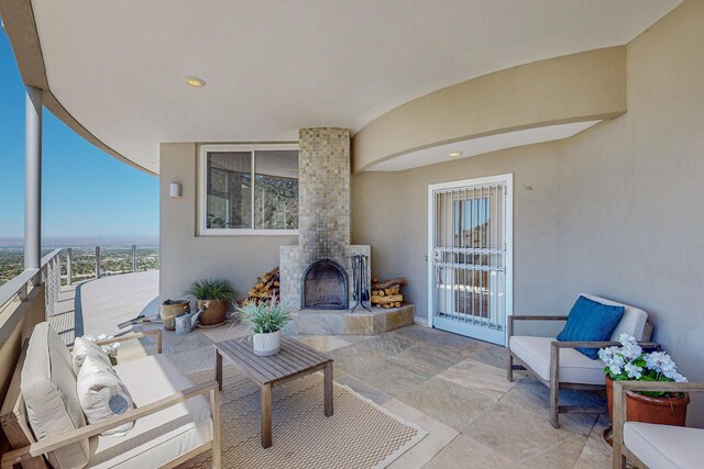 view of patio / terrace with a balcony