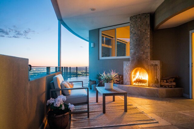 view of balcony at dusk