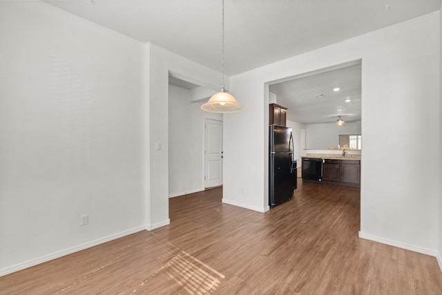 interior space featuring sink and hardwood / wood-style floors