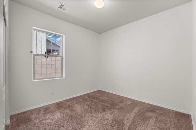 unfurnished room with carpet