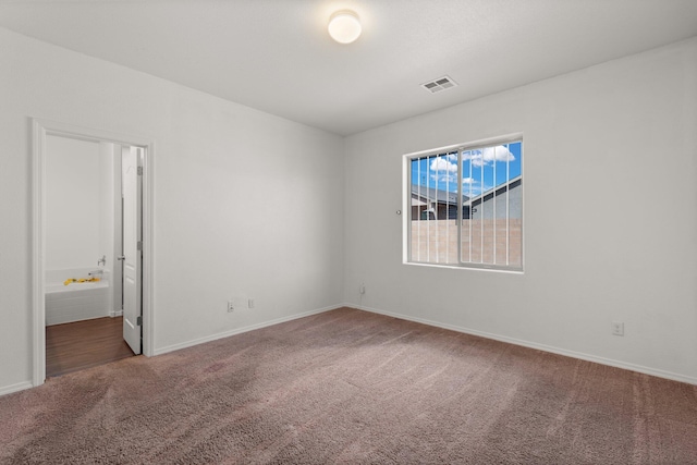 view of carpeted spare room