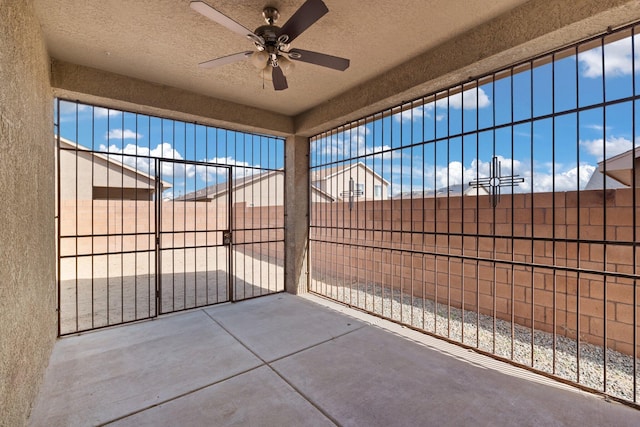 view of patio with ceiling fan