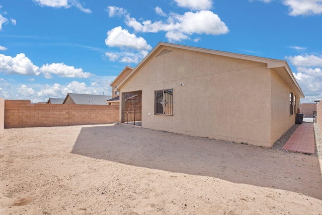 rear view of house with a patio