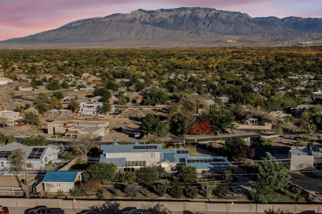 aerial view at dusk with a mountain view