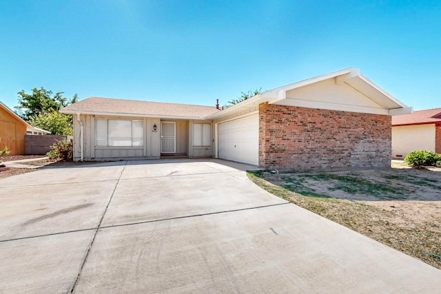 ranch-style home featuring a garage