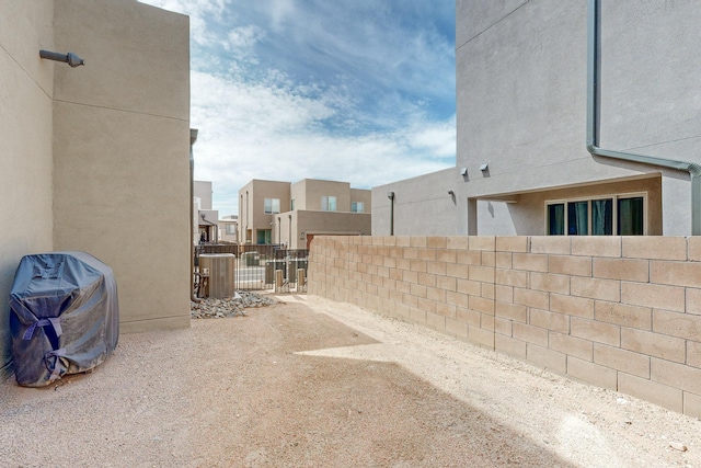 view of patio with central AC unit