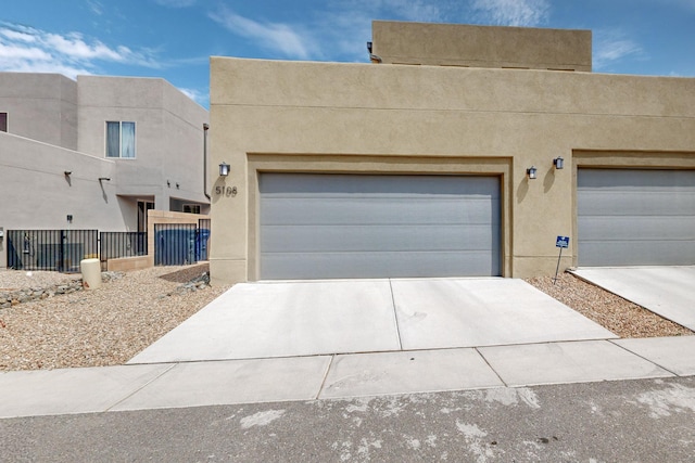 southwest-style home with a garage