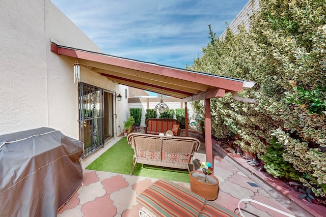 view of patio with an outdoor hangout area and area for grilling