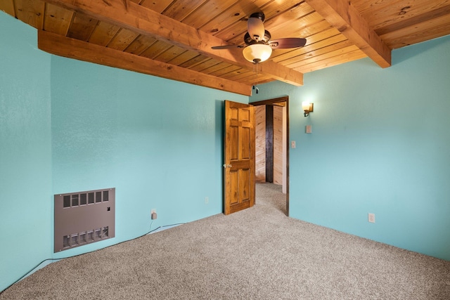 unfurnished bedroom with radiator heating unit, wooden ceiling, beam ceiling, light colored carpet, and ceiling fan