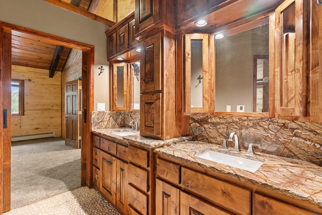 bathroom with lofted ceiling with beams, baseboard heating, wooden walls, decorative backsplash, and wooden ceiling