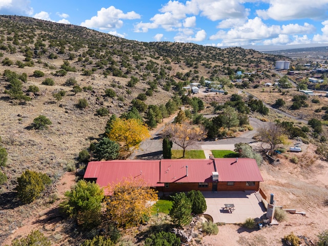 drone / aerial view featuring a mountain view