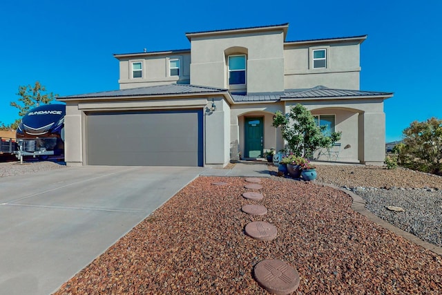 view of front of property featuring a garage