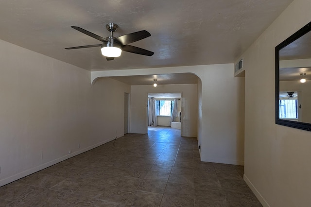 spare room featuring ceiling fan