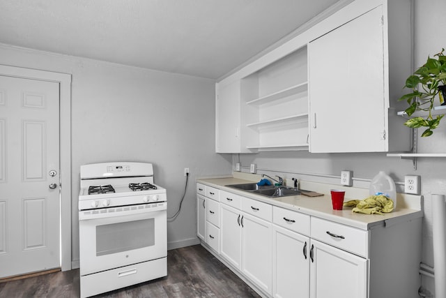 kitchen with white range with gas cooktop, white cabinetry, sink, and dark wood-type flooring