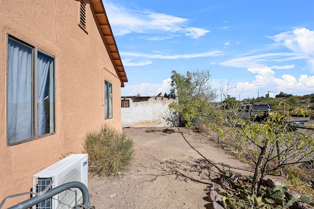 view of property exterior featuring ac unit