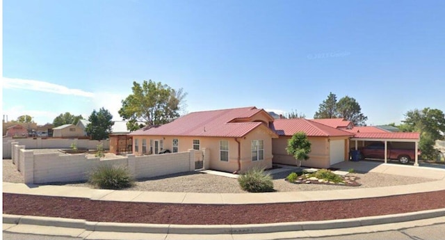 single story home with a garage