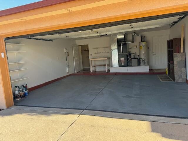 garage with secured water heater and heating unit