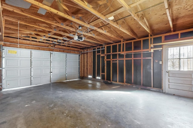 garage featuring a garage door opener