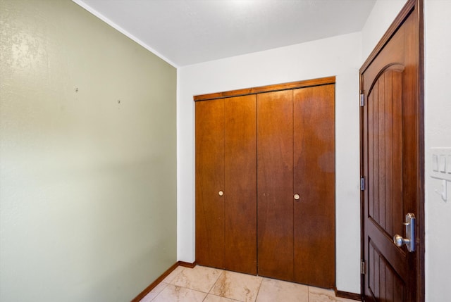 unfurnished bedroom with a closet