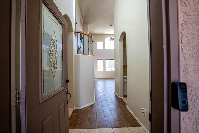 corridor featuring dark hardwood / wood-style floors