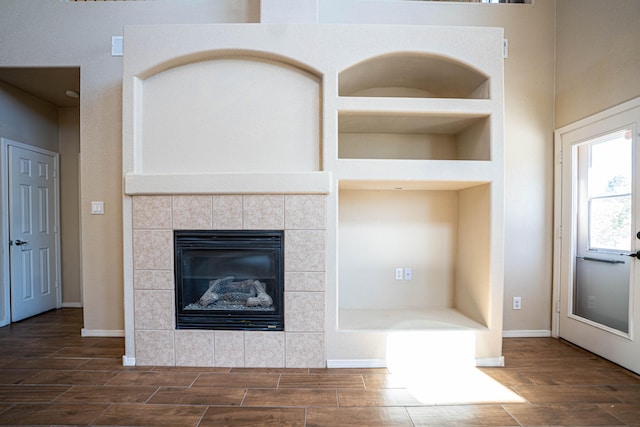 room details with a fireplace and built in features