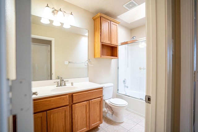 full bathroom with toilet, enclosed tub / shower combo, vanity, and tile patterned floors