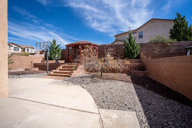 view of yard with a gazebo and a patio area