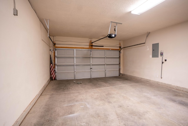 garage featuring a garage door opener and electric panel