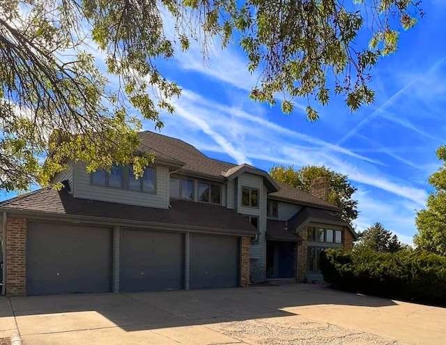 view of front of property featuring a garage