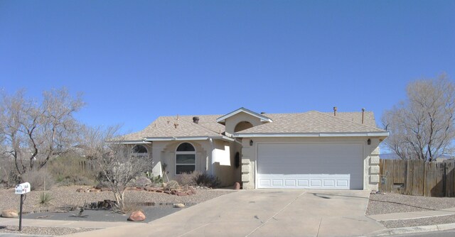 single story home featuring a garage