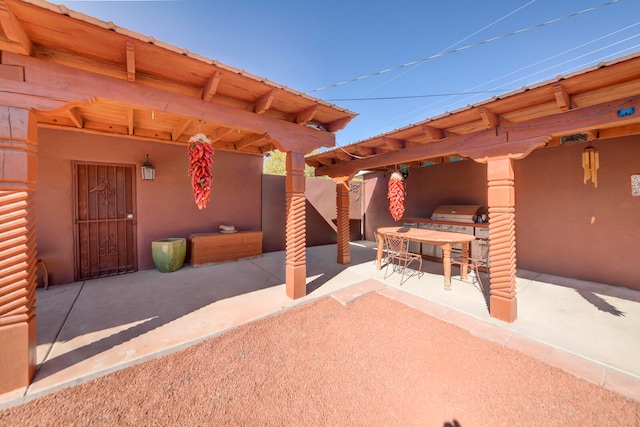 view of patio / terrace featuring a grill