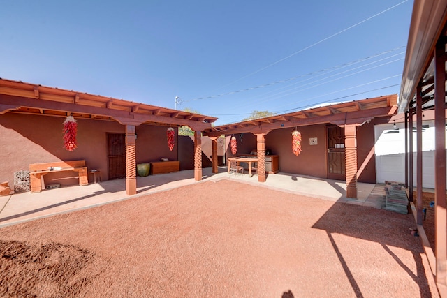 exterior space with a pergola