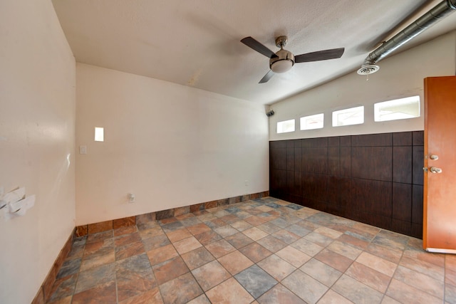 spare room with ceiling fan