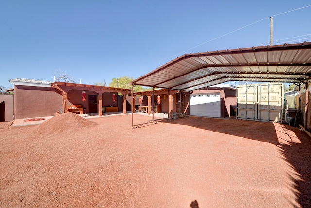 exterior space with a carport