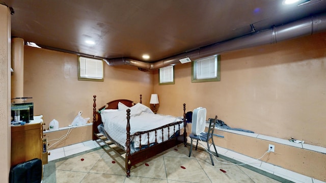 tiled bedroom featuring visible vents