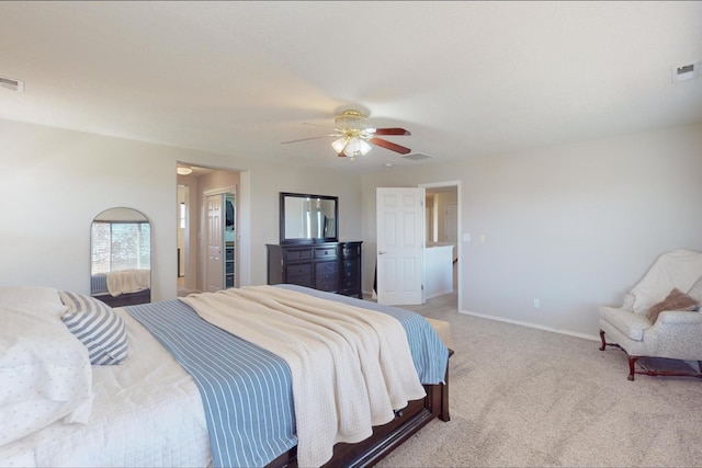 bedroom featuring light carpet and ceiling fan