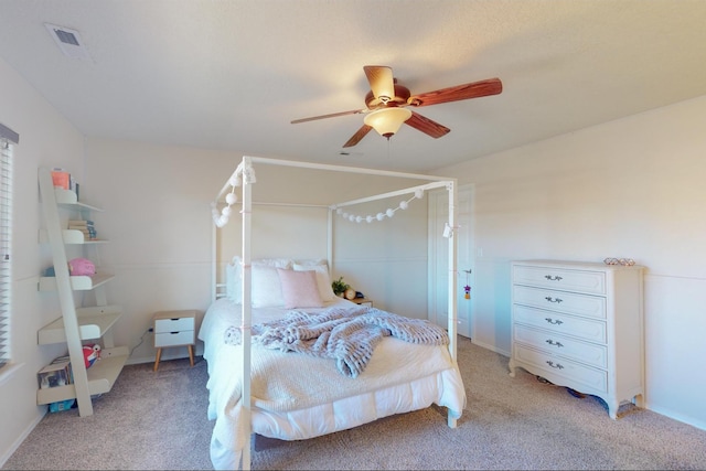 carpeted bedroom with ceiling fan