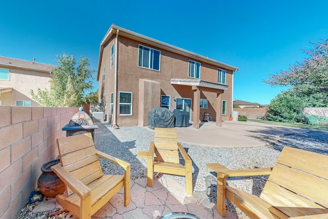 rear view of property with a patio